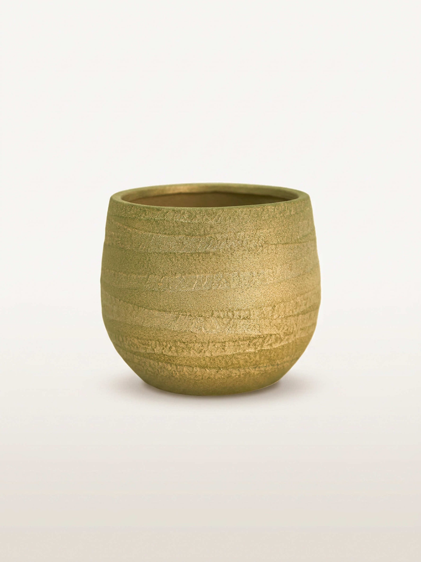 Le Cascade Opaline N°1 de taille S présente une texture striée dorée et verte sur sa surface en céramique